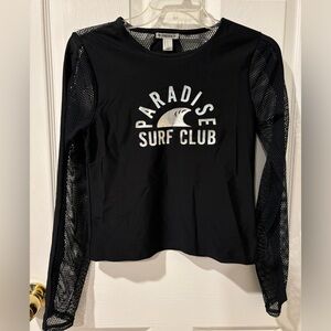 Rashguard with mesh sleeves. Gently worn.size junior M